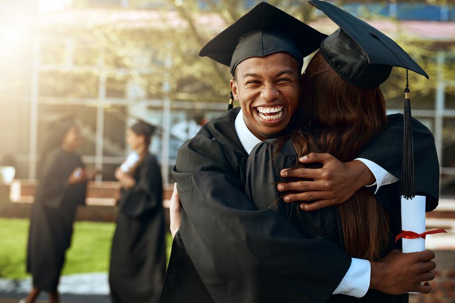 together-forever-love-education-portrait-happy-young-man-woman-hugging-graduation-day_590464-12119